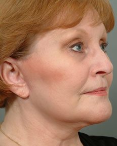 side view of a woman wearing make up