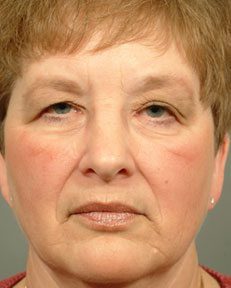 a woman with makeup on