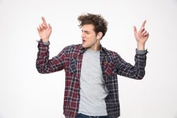 Man enjoying music through headphones