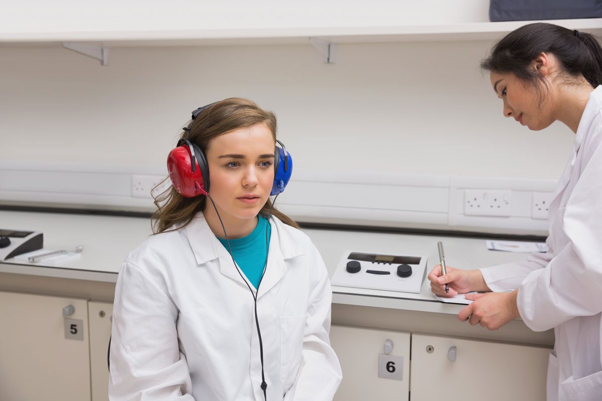 Woman receiving hearing test